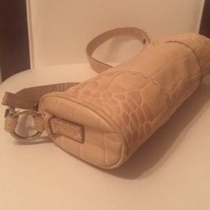 DONALD J PLINER CLUTCH